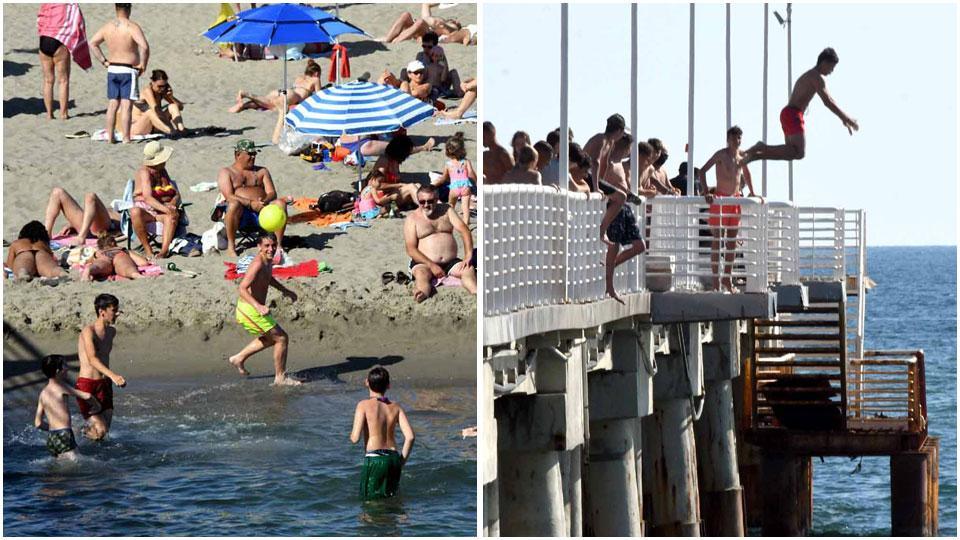 Le spiagge affollate nella giornata di ieri e i tuffi (vietatissimi) dal pontile
