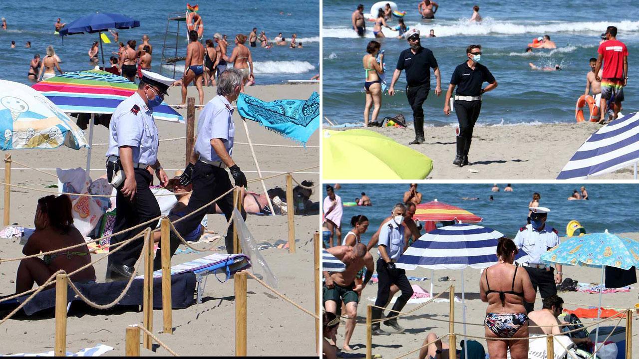 Le immagini della domenica mattina sulle spiagge libere del porto e della Rotonda a Marina di Carrara. Alcuni turisti dal nord sono scesi dai pullman e si sono sistemati in battigia non avendo la prenotazione
necessaria per poter accedere agli stalli creati per rispettare le normative anti covid. In spiaggia si sono creati assembramenti subito segnalati: sono intervenuti i vigili e la polizia per farli allontanare