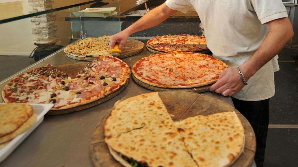 Pizzaiolo e cameriere da “Little Italy”