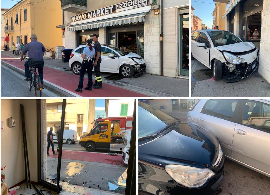 Auto piomba contro l’ingresso di un negozio 