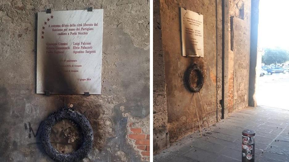 Incendiata la corona per i partigiani, danni alla lapide e alle Mura