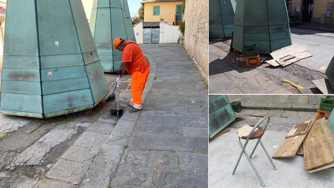 Rifiuti e confusione nella strada che porta in piazza del Duomo