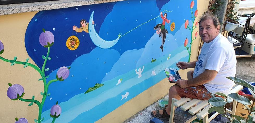 Mascherine anti Covid protagoniste assolute nei murales estivi del naif Franco Mora 