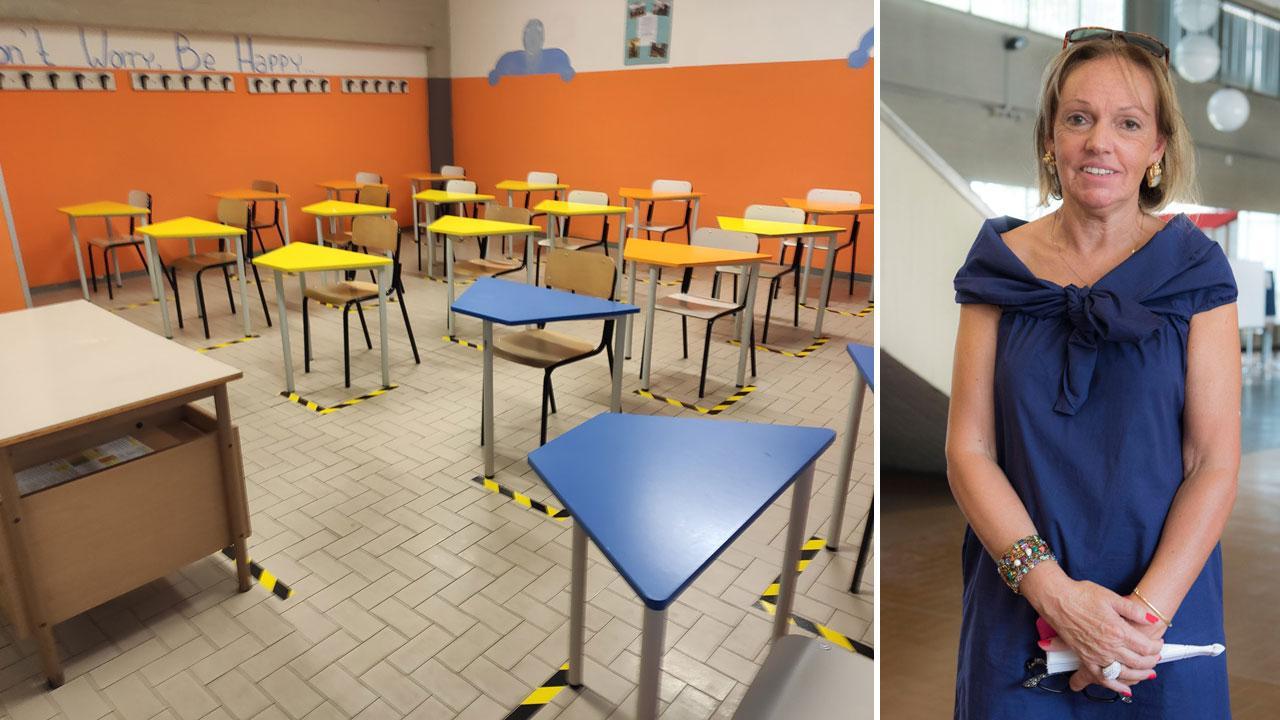 Una delle aule con i banchi monoposto dell’istituto Fermi di Lucca. A destra la provveditora Donatella Buonriposi