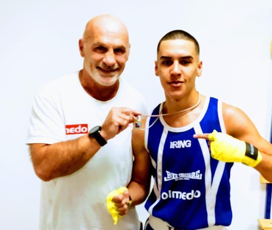 Hicham Outtas con il suo allenatore, il maestro Valentino Manca