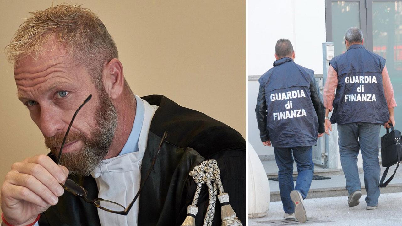 Nella foto l'avvocato Andrea Di Giuliomaria e la Guardia di Finanza