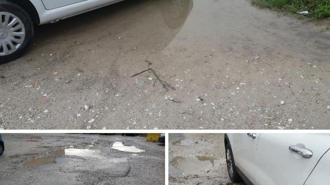 Proteste per l’area di sosta piena di buche