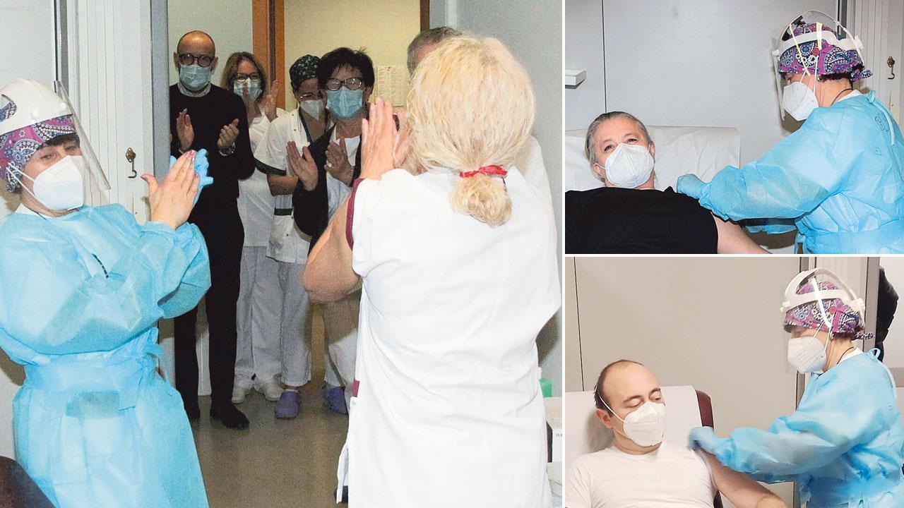 L'infermiera Debora Arrichiello somministra la dose di vaccino a Cinzia Marchetti e Salvatore Romano