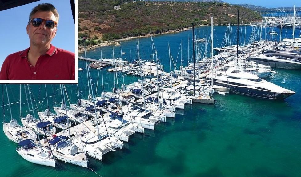 Barche e catamarani attraccati in porto e, nel riquadro, Simone Morelli