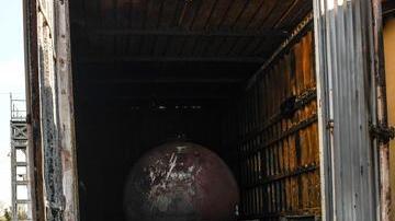 Incendio nel container