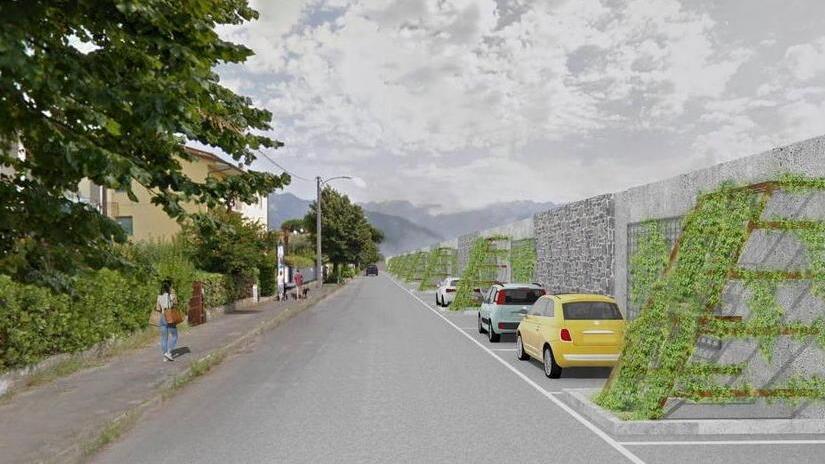 Pietre, piante rampicanti e ottanta parcheggi: ecco il muro sul Frigido