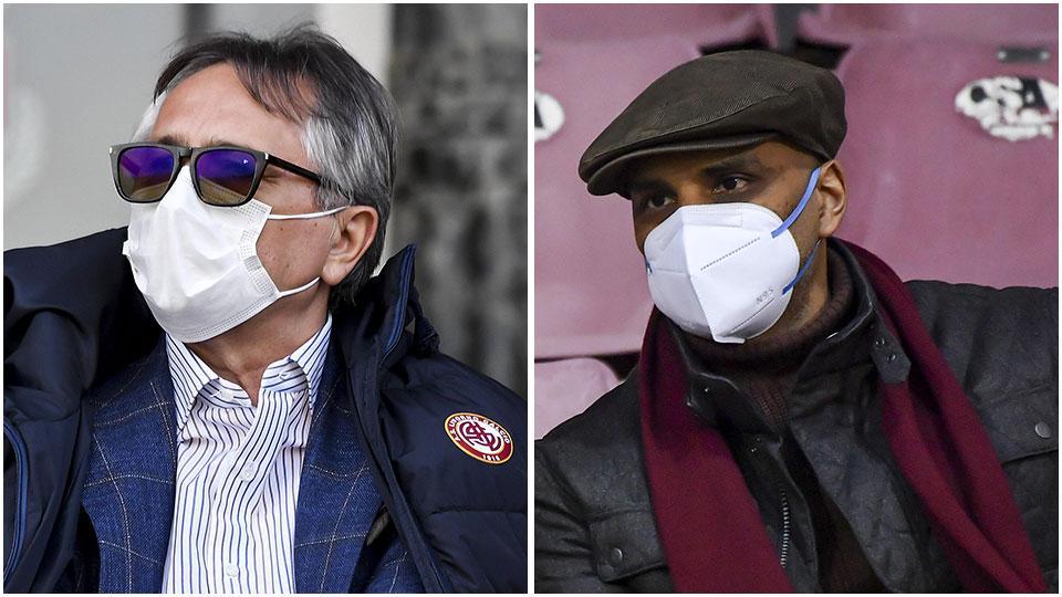 L’imprenditore serbo Zoran Popovic seduto nel palchetto vip dello stadio, con il giacchetto ufficiale del Livorno Calcio sopra alla giacca e Yogesh Maurya