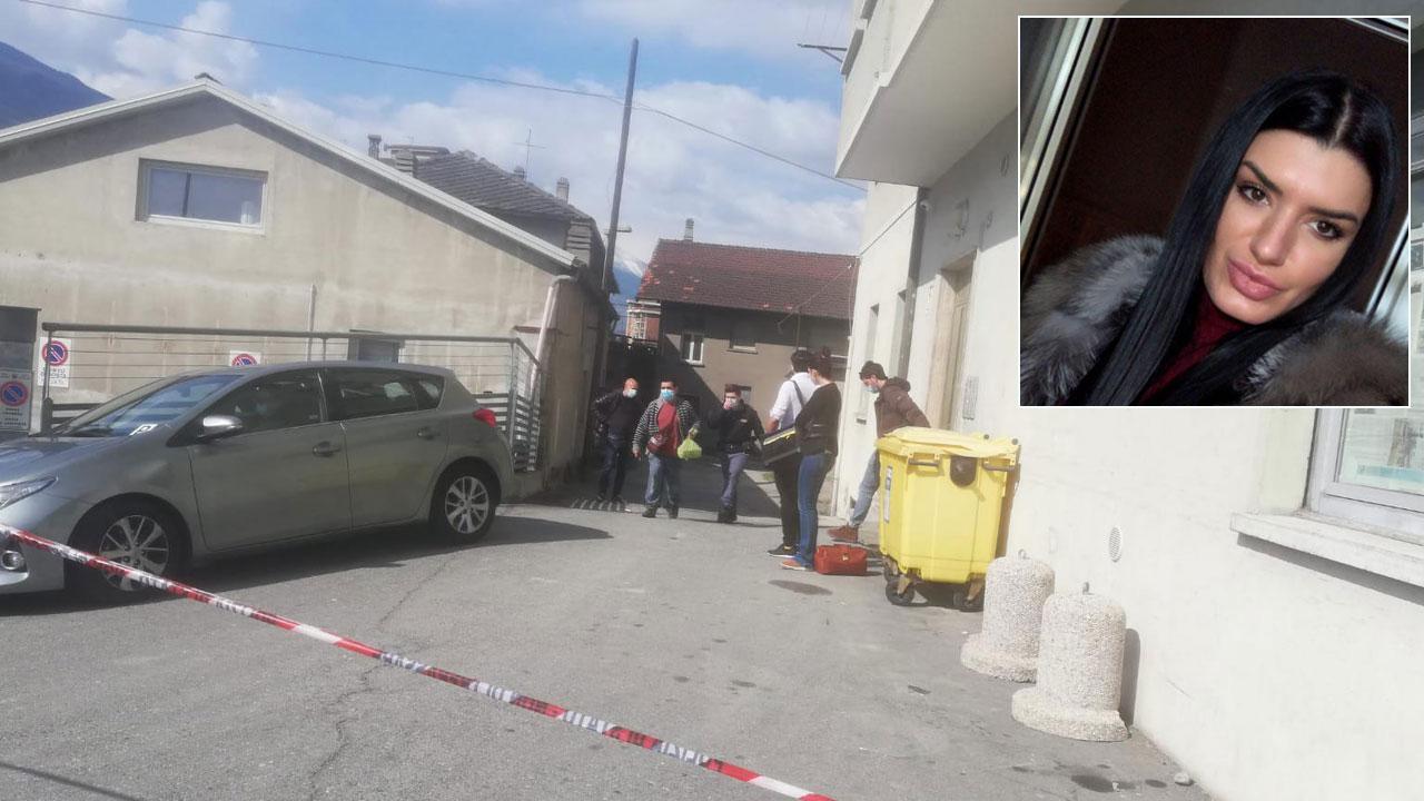 La polizia mentre esce dal portone di ingresso del condominio dove Elena Raluca Serban (foto nel riquadro) è stata uccisa. La ragazza era arrivata a Lucca poco più che adolescente e ci ha vissuto fino a sei anni fa