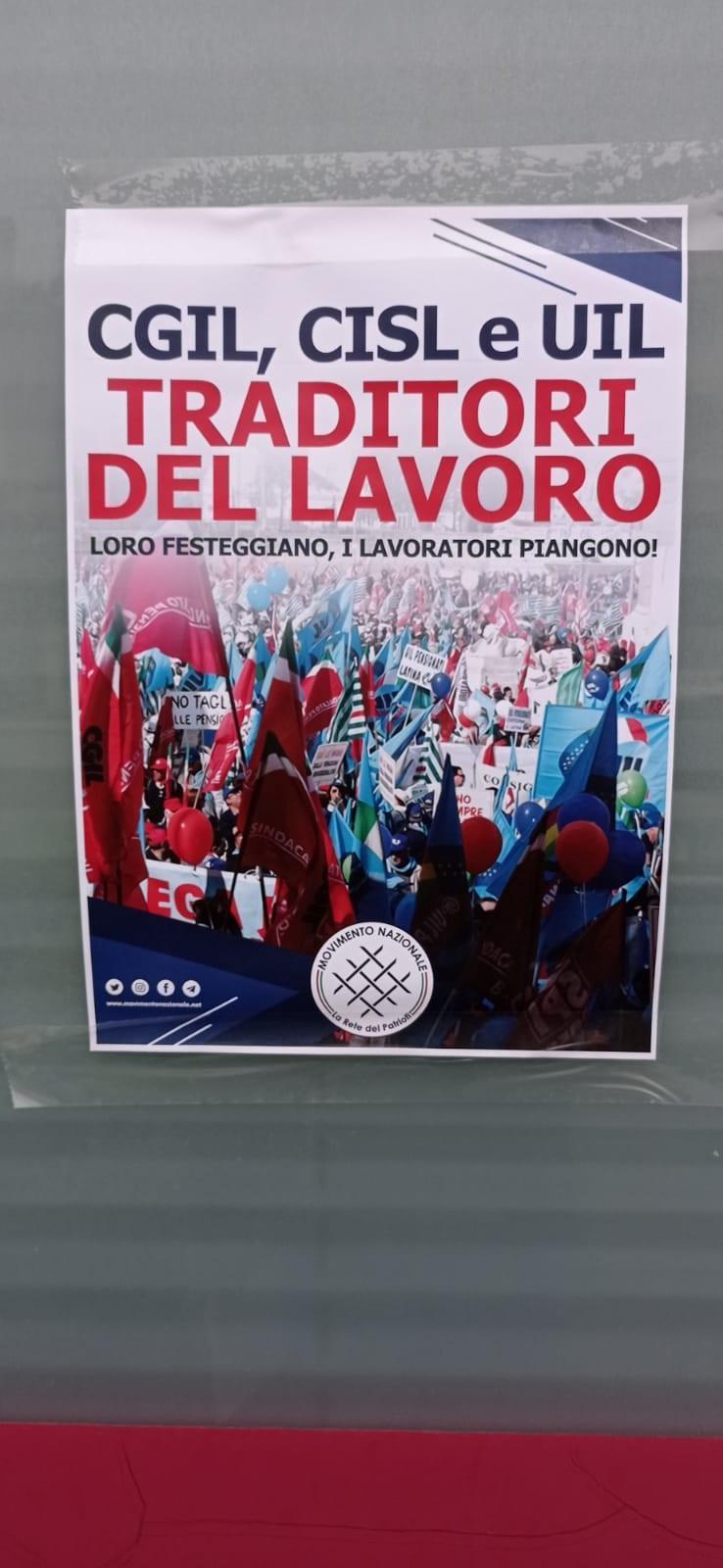 Uno dei manifesti affissi davanti alle sedi della Cgil