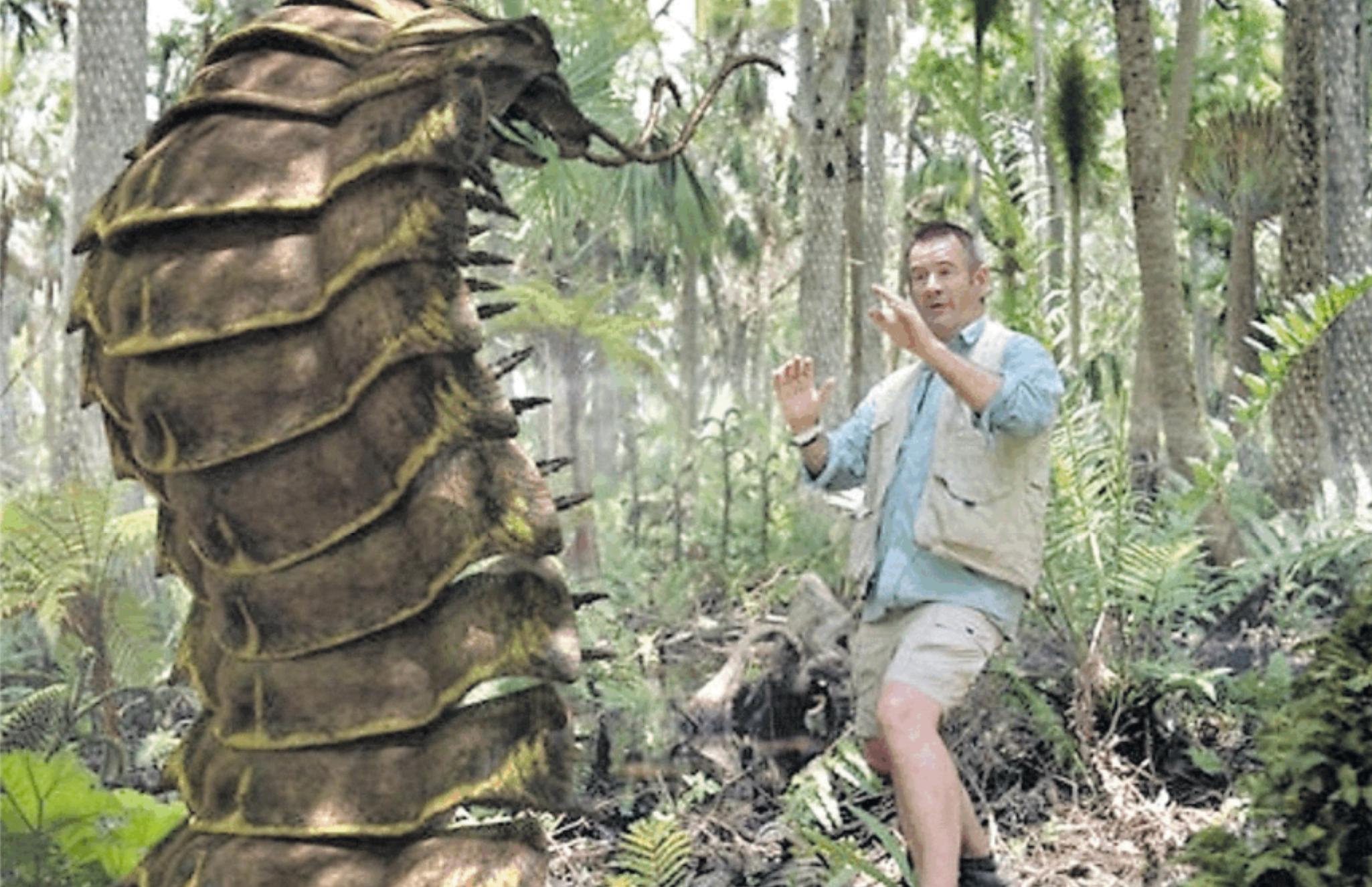 Un’immagine tratta da una puntata di Prehistoric Park in cui il conduttore Nigel Marven incontra un Arthropleura