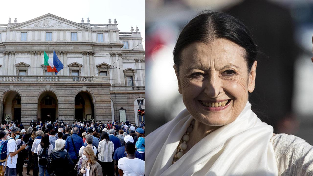 Una grande folla commossa davanti alla Scala per la camera ardente