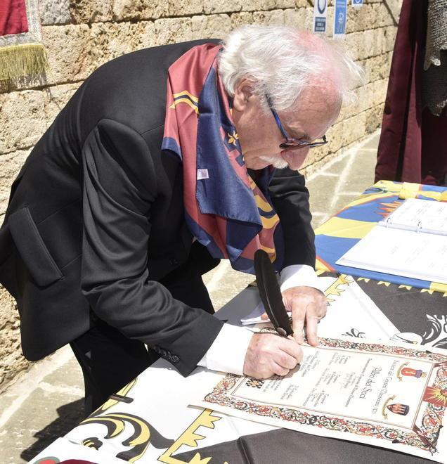 Statuto del Balestro, firma tra le bandiere