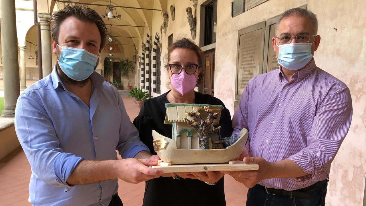 Gabriele Beschi, Chiara Lanfranconi e Sergio La Porta con il premio