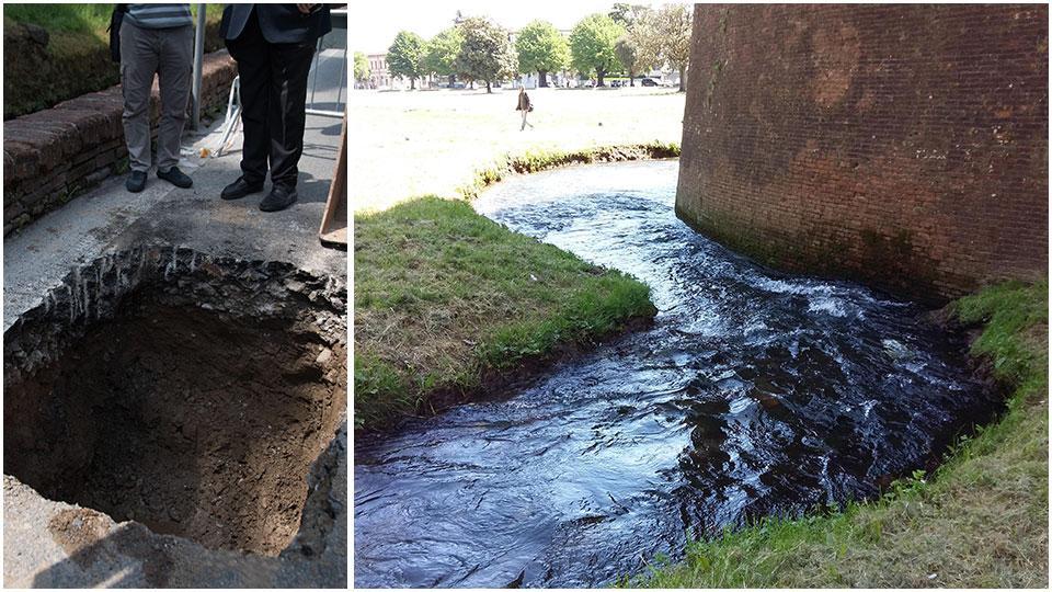 Un’immagine della voragine che si è aperta in via del Fosso; a destra il condotto pubblico nel punto in cui fiancheggia il baluardo di San Colombano