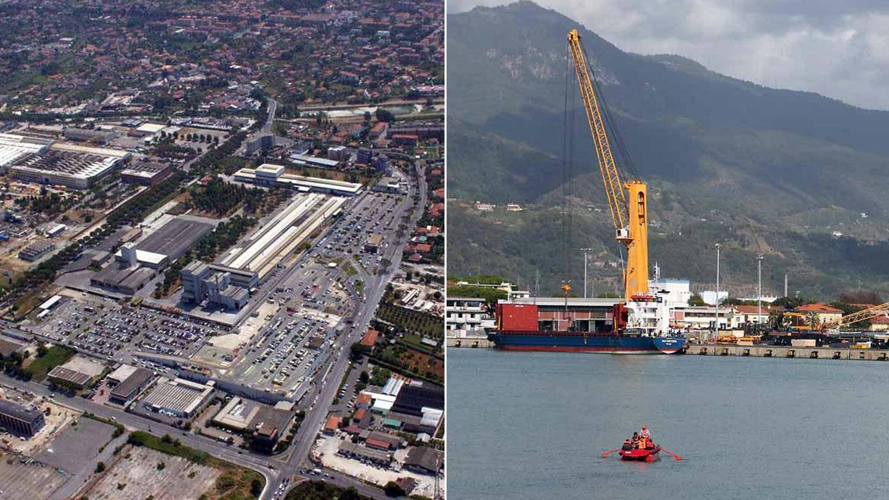 Qui sopra una veduta dell'area industriale, accanto il porto di Marina di Carrara
