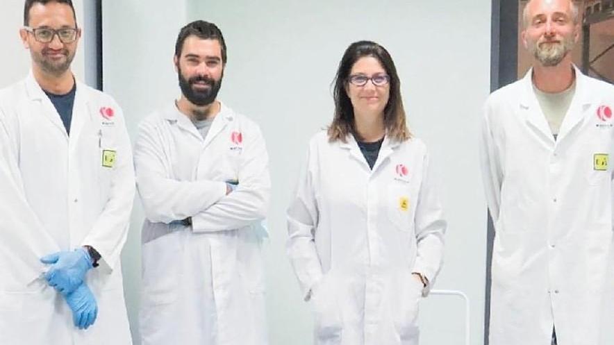 Foto di gruppo per alcuni specialisti del team di Kayser