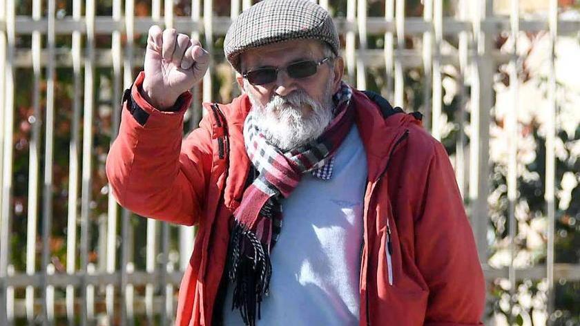Giancarlo Bertucelli, con il pugno alzato
