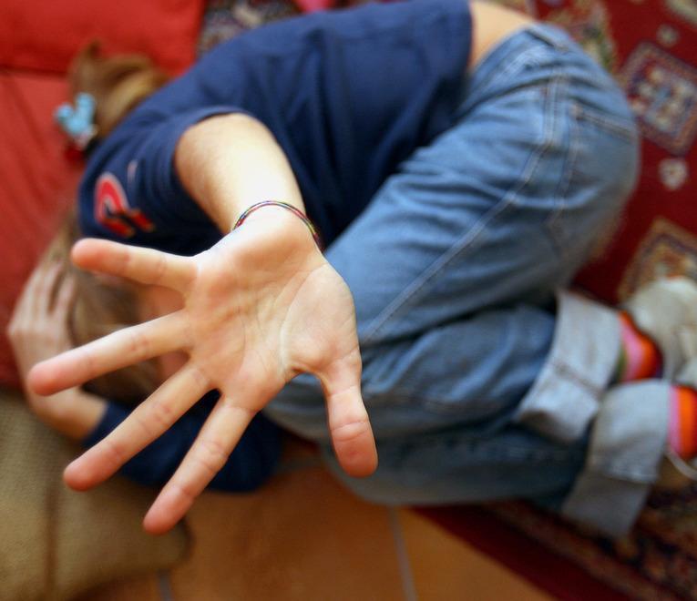 Un’immagine simbolica di un bimbo maltrattato