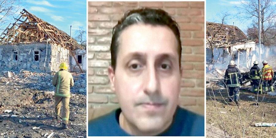 Mirko Vangi, pratese che si trova a Chernihiv. Sullo sfondo una casa bombardata