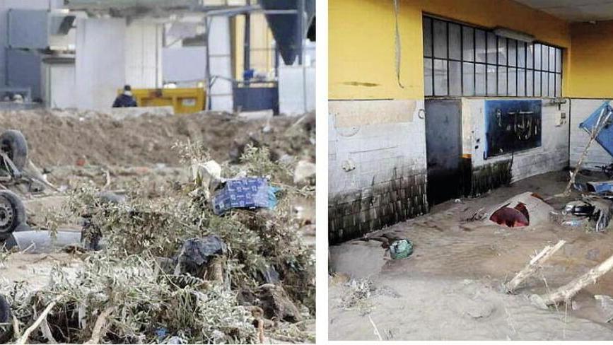 Auto trascinate dal Carrione in piena e l’officina della concessionaria vicina all’argine crollato invasa dal fango