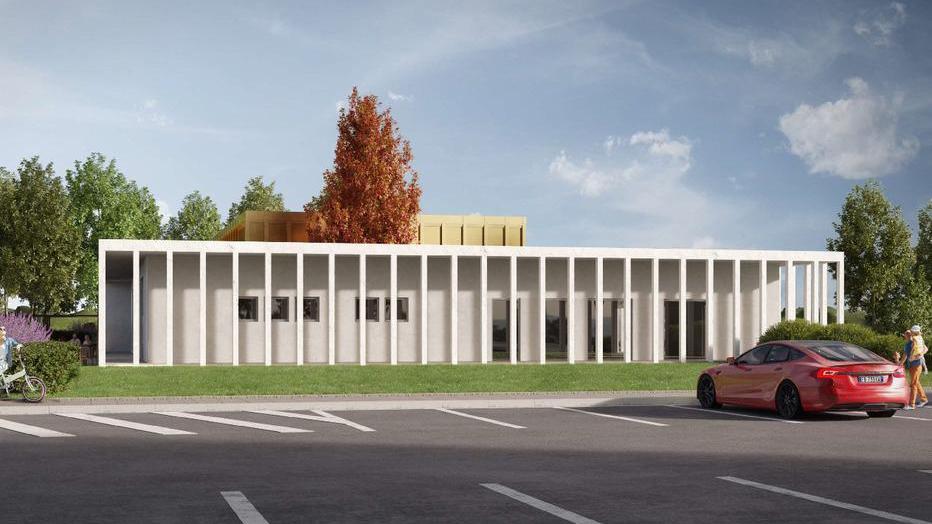 Il rendering del nuovo edificio alle spalle del palazzetto