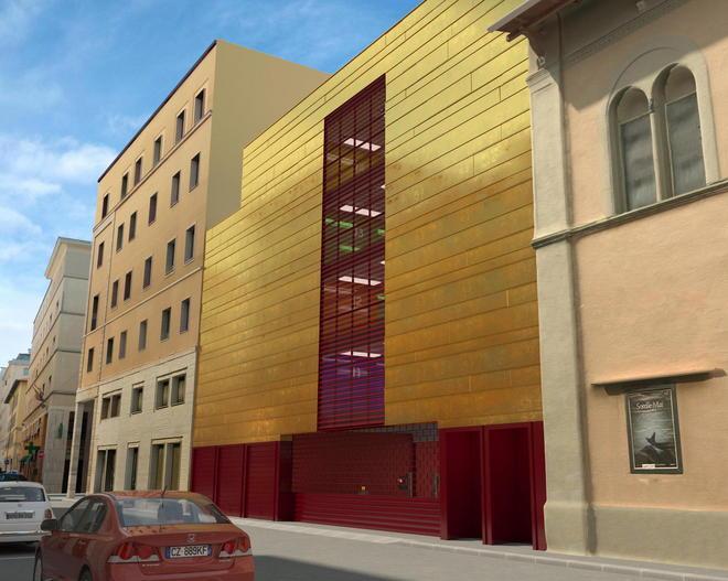 Un parcheggio con la facciata color oro e inserti rossi: vi piace o no? 