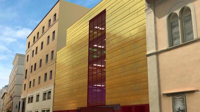 Un parcheggio con la facciata color oro e inserti rossi: vi piace o no?