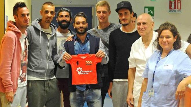 Giocatori in visita al reparto di pediatria