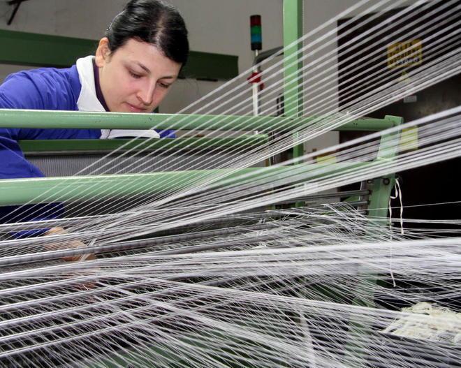In flessione le esportazioni dei tessuti pratesi 
