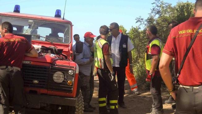 Un falò per riscaldarsi in attesa del nuovo giorno