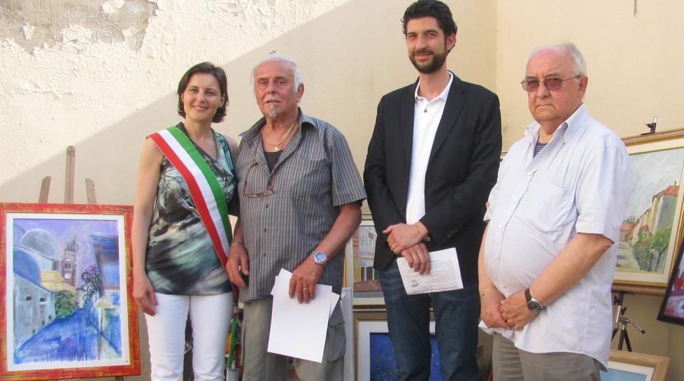 La fiera di Vigarano Mainarda nei quadri di venti artisti 