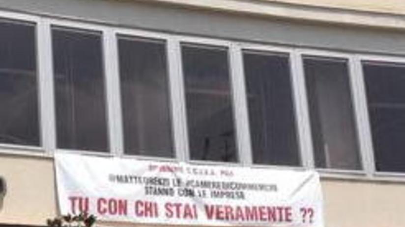 Uno striscione in difesa delle Camere di Commercio